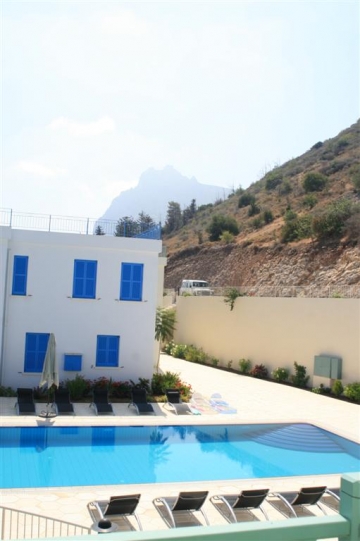 Hilarion Court, looking east over pool towards St Hilarion Castle